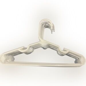 Lot of 65 children’s size plastic hangers. Variety